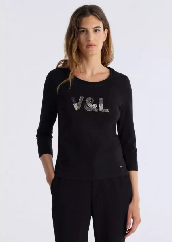 Camiseta negra con pedrería